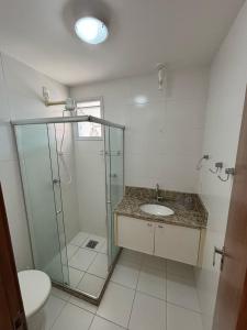 Koupelna v ubytování Lumar Apartamento em praia do morro + 7 fotografií