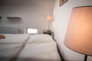Posteľ alebo postele v izbe v ubytovaní Cuba Bar & Hostel