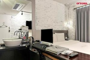 Postel nebo postele na pokoji v ubytování Hotel Yaja Terminal Branch