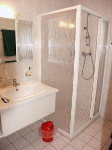 a bathroom with a shower and a sink at Gästehaus Leithen in Bad Birnbach