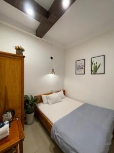 Postel nebo postele na pokoji v ubytování Kim Quang