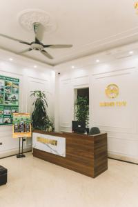 an office with a reception desk in a lobby at Tam Coc Harbor Hotel & Travel By ANMS GROUP in Ninh Binh +72 photos