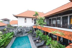 Bazén v ubytování Sans Vibes Puri Mango Hotel Sanur nebo v jeho okolí