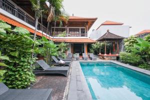 Bazén v ubytování Sans Vibes Puri Mango Hotel Sanur nebo v jeho okolí