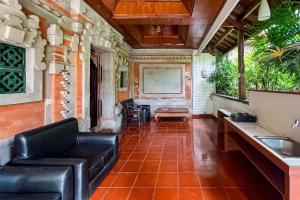 Posezení v ubytování Sans Vibes Puri Mango Hotel Sanur