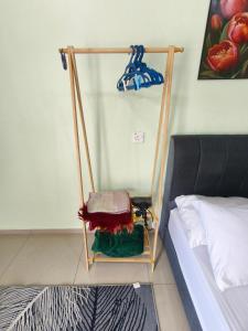 Voodi või voodid majutusasutuse Sialang Damai Inn toas