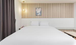 Postel nebo postele na pokoji v ubytování HOTEL bonito