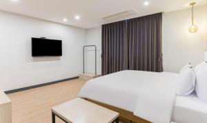 TV a/nebo společenská místnost v ubytování HOTEL bonito