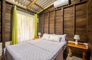 Postel nebo postele na pokoji v ubytování Cabaña paraíso escondido