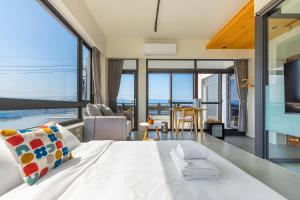 Cama o camas de una habitación en 河海之間 Between River and Sea
