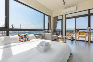 Cama o camas de una habitación en 河海之間 Between River and Sea