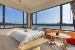 Cama o camas de una habitación en 河海之間 Between River and Sea
