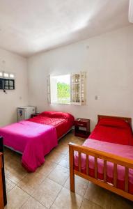 Postel nebo postele na pokoji v ubytování NOVOS Departamentos Temporarios Catamarca apart