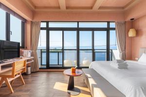 Cama o camas de una habitación en 河海之間 Between River and Sea