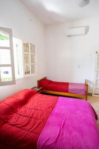 Postel nebo postele na pokoji v ubytování NOVOS Departamentos Temporarios Catamarca apart