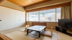 TV a/nebo společenská místnost v ubytování Atami New Fujiya Hotel