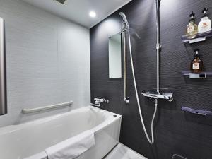 Koupelna v ubytování Izutsu hotel Takasegawa