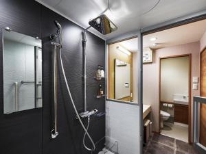 Koupelna v ubytování Izutsu hotel Takasegawa