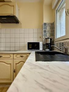Dapur atau dapur kecil di Charmant Appartement - 2 chambres - Carcassonne Centre +8 gambar