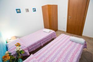 Posteľ alebo postele v izbe v ubytovaní Hortensia House