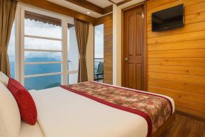 TV a/nebo společenská místnost v ubytování Summit Grace Boutique Hotel & Spa