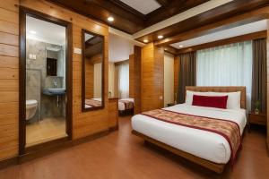 Summit Grace Boutique Hotel & Spa客房内的一张或多张床位