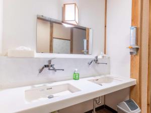 Ванная комната в 檜湯の宿　松伯 +107 фотографий