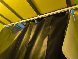 a curtain is hanging in a tent at 我的房间 in Vientiane
