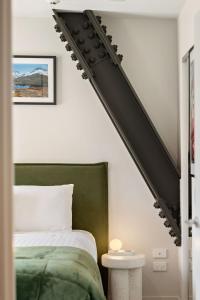 En eller flere senge i et værelse på Remarkable Retreat