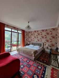 Postel nebo postele na pokoji v ubytování North Kazbegi + 22 fotografií