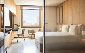 Posteľ alebo postele v izbe v ubytovaní Grand Hyatt Barcelona