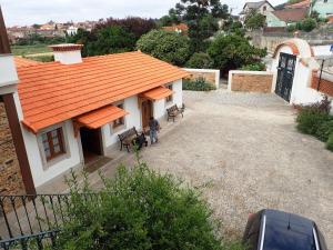 an overhead view of a building with an orange roof at Solar do Alambique in Angeja