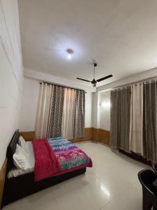 Letto o letti in una camera di Hotel Shree Ram