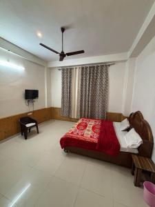 Letto o letti in una camera di Hotel Shree Ram