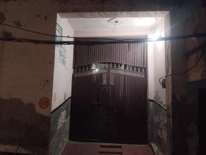 a door in a building with a gate at Mohd saleem in Ghaziabad