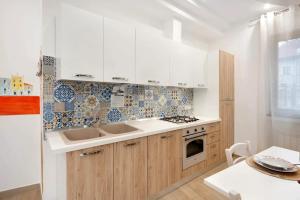 Køkken eller tekøkken på Casa Vacanze La Via delle Stelle