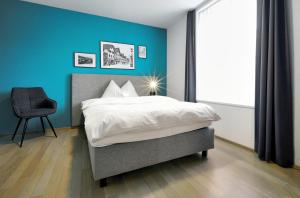 Ένα ή περισσότερα κρεβάτια σε δωμάτιο στο Hotel Zugertor