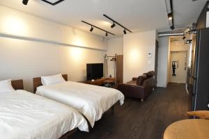 Un pat sau paturi într-o cameră la NIYS apartments 37type