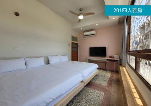 TV o dispositivi per l'intrattenimento presso Romance Guest House