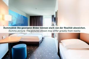 Postel nebo postele na pokoji v ubytování B&B HOTEL Passau-Süd