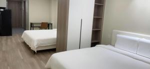 City Center Executive Hotel-Near Manila Airport and PITX客房内的一张或多张床位