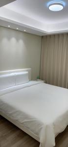 City Center Executive Hotel-Near Manila Airport and PITX客房内的一张或多张床位