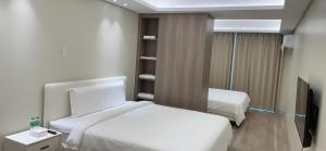 City Center Executive Hotel-Near Manila Airport and PITX客房内的一张或多张床位