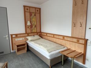 Postel nebo postele na pokoji v ubytování Hotel Wetterau - Self-Check-In