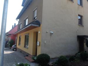a building with a door on the side of it at Ferienwohnung Jehn in Fulda