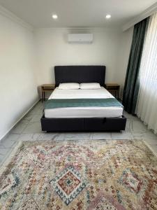 Postel nebo postele na pokoji v ubytování Demre Asya Apart