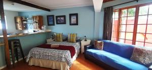 Χώρος καθιστικού στο Hermanus Backpackers & Budget Accommodation