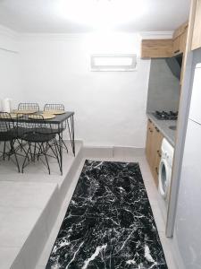 Kuchyň nebo kuchyňský kout v ubytování Demre Asya Apart