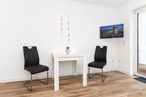 Galeriebild der Unterkunft Ferienwohnungen mit Terrasse im Haus Seekieker in Bensersiel