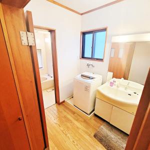 Koupelna v ubytování Guesthouse & Sharehouse カリマ安曇沓掛 + 37 fotografií